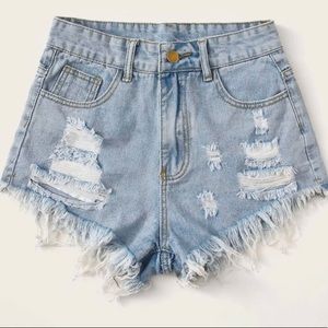 Ripped denim shorts